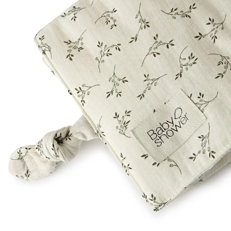 Babyshower.Tapis à langer Nomade Knot Olive Bloom 3.webp