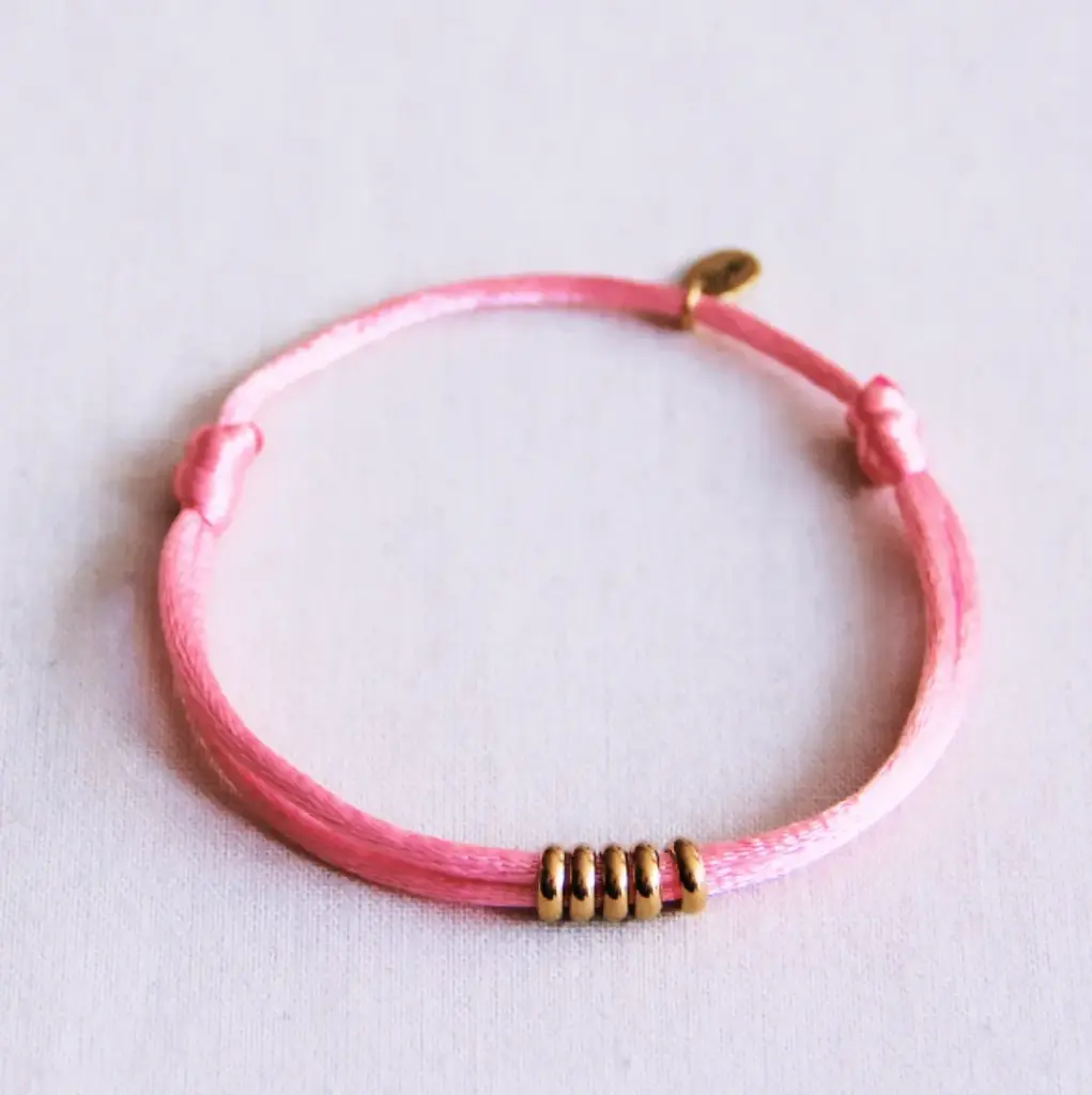Satijnen armband met ringen roze goudkleurig - Bazou