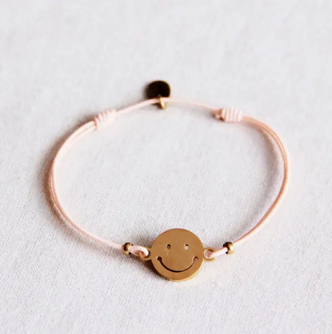 Elastische armband met smiley perzik goud - Bazou